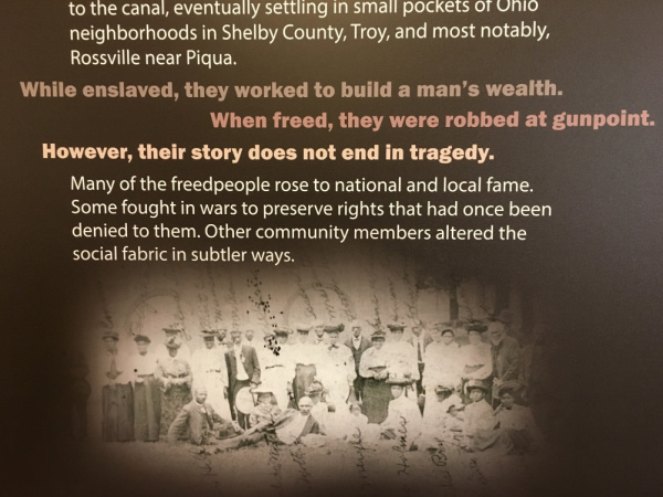 Photograph of part of one of the panels from the exhibit, Freed Will: The Randolph People From Slavery to Settlement. The panel includes a historic photo and text.