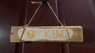 Bee Kind sign made with wood and paper
