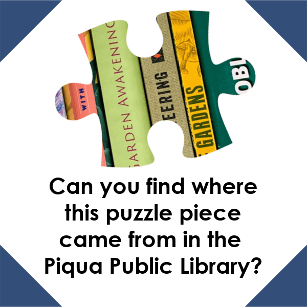 A graphic with a white background and navy blue corners. There is a puzzle piece with book spines on it in the center. The black text under the puzzle piece reads "Can you find where this puzzle piece came from in the Piqua Public Library?"
