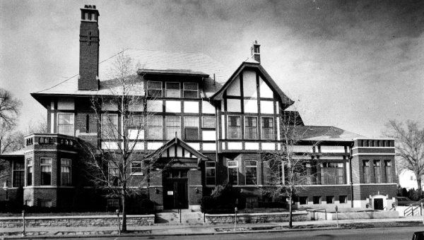 Black and white photograph of the Flesh Public Library building, formerly the Piqua Men's Club, in the 1970s.